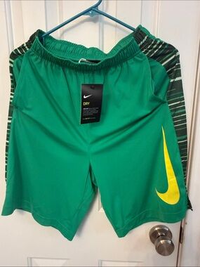 NWT Boy’s Nike Green Shorts with Yellow Swoosh